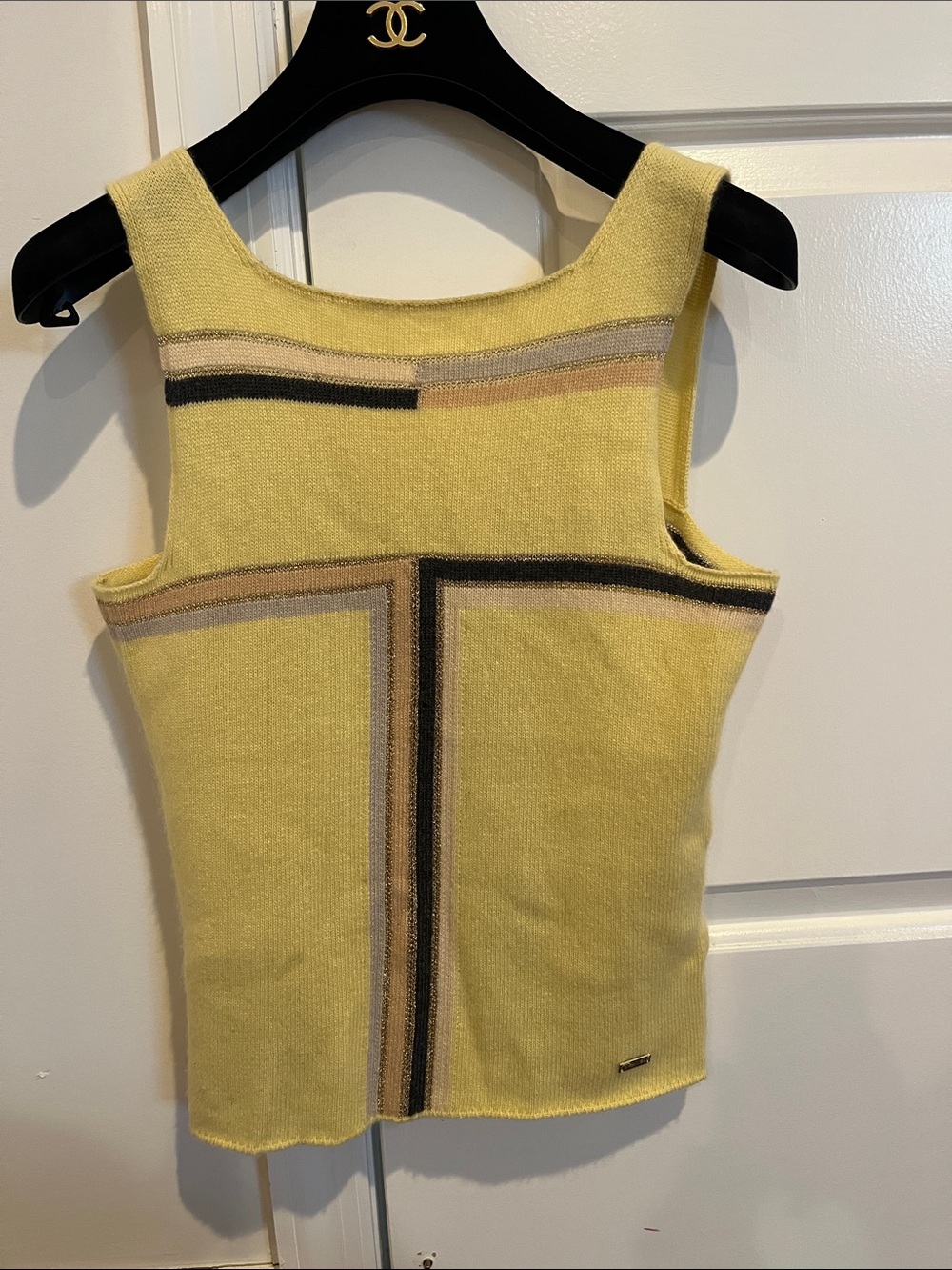 CHANEL Cream Knit Top with Metal Logo Plaque